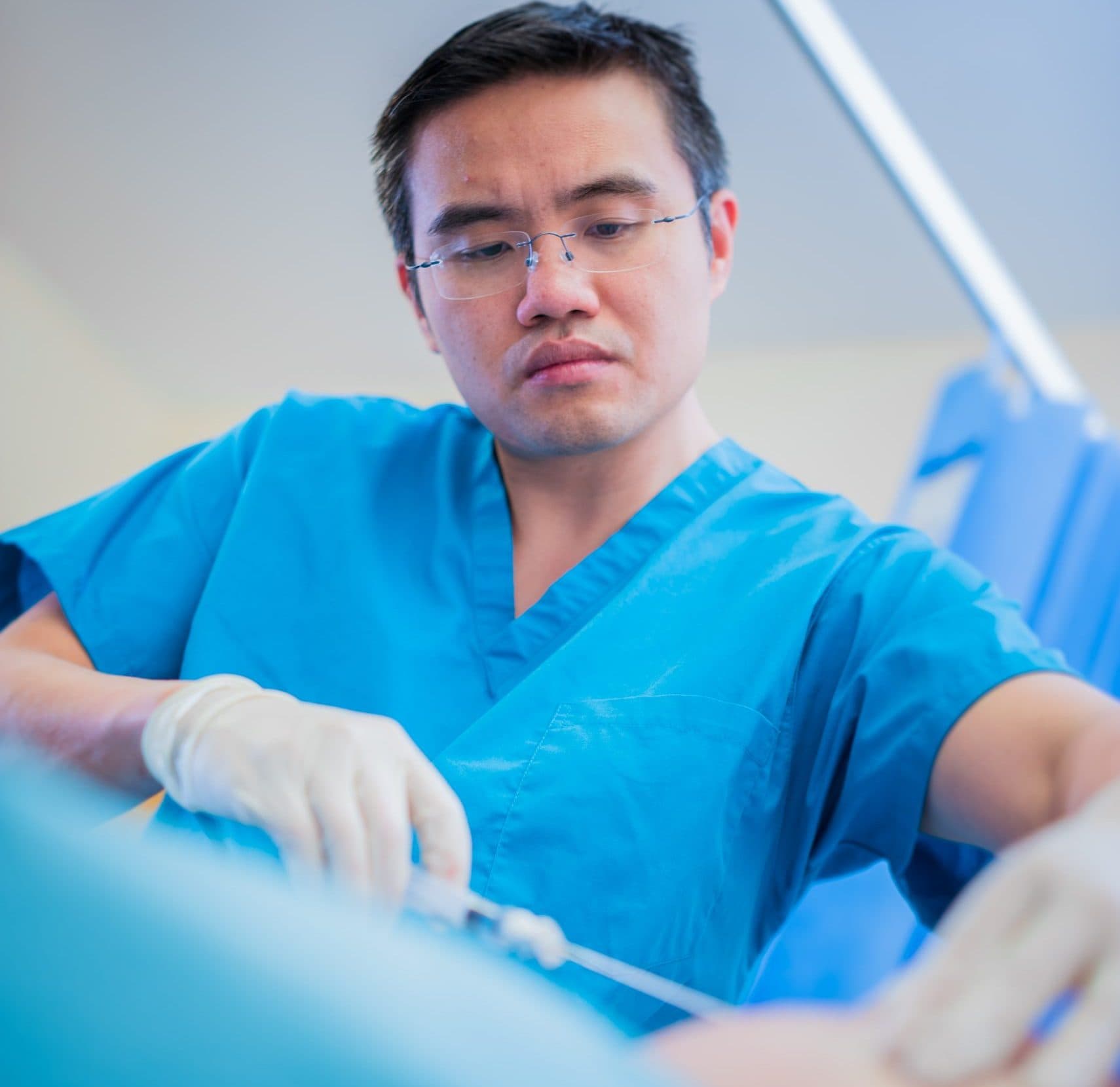Surgeon performing advanced cartilage implantation